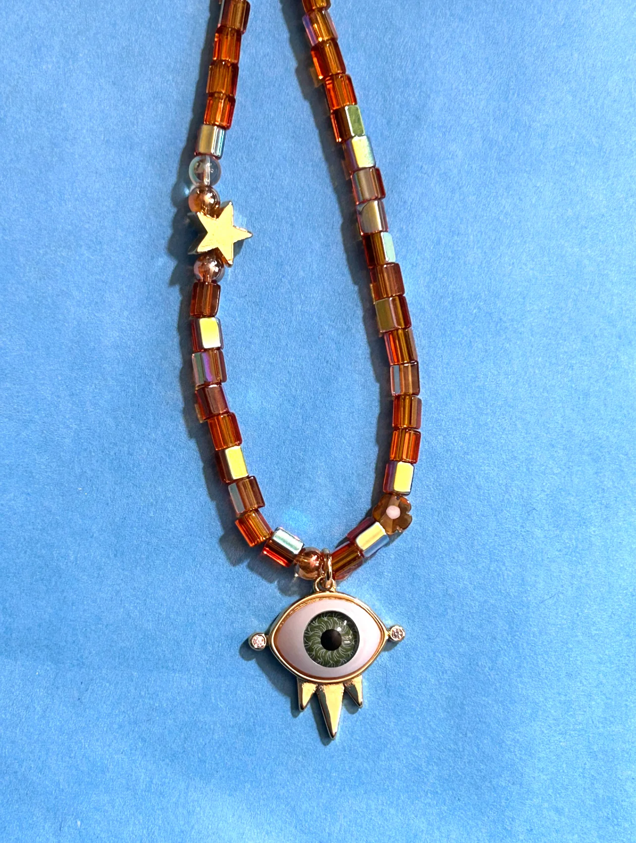 The Topaz eye Necklace
